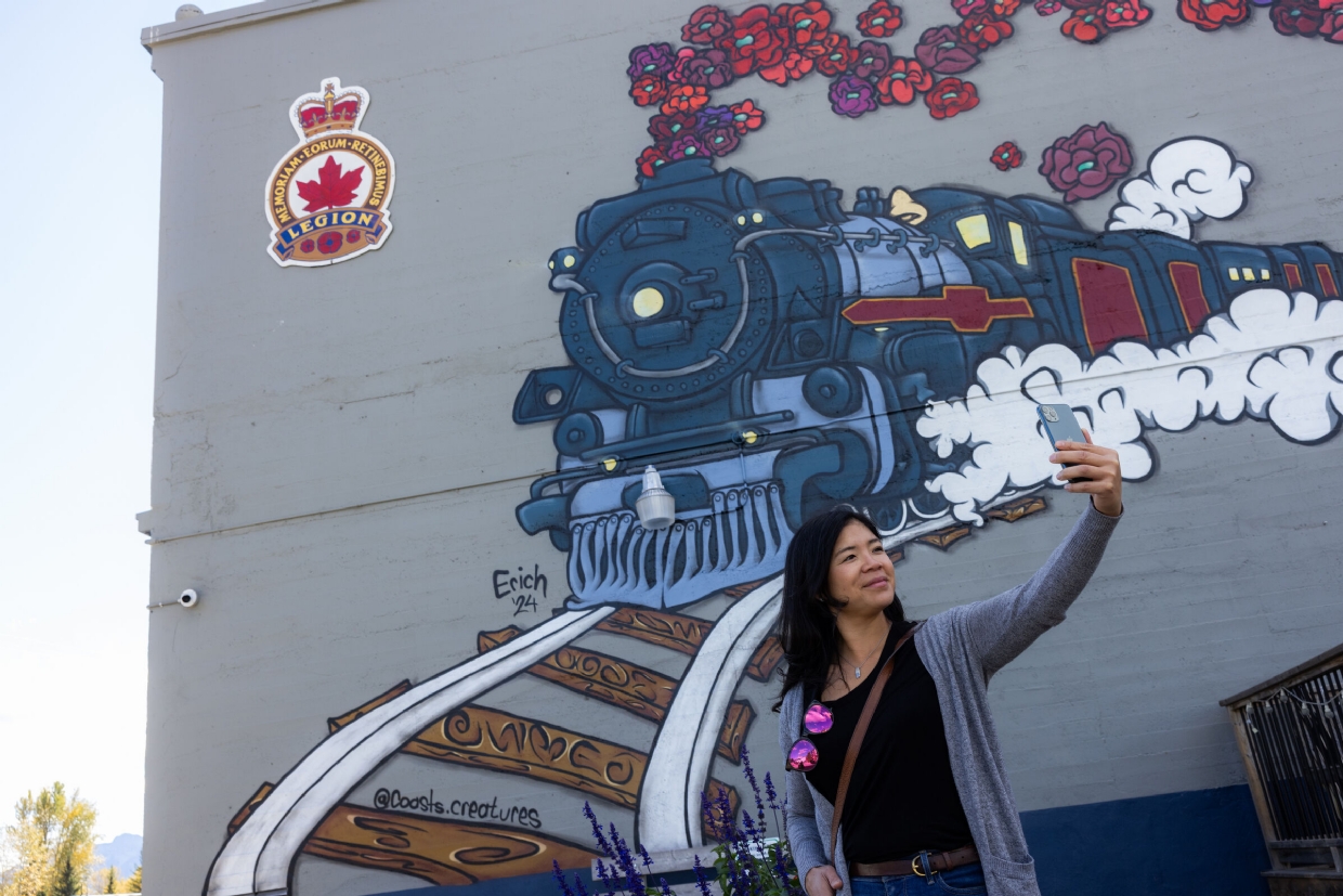  'All Aboard' Mural by Eric Stoffels on the wall of the Fernie Legion