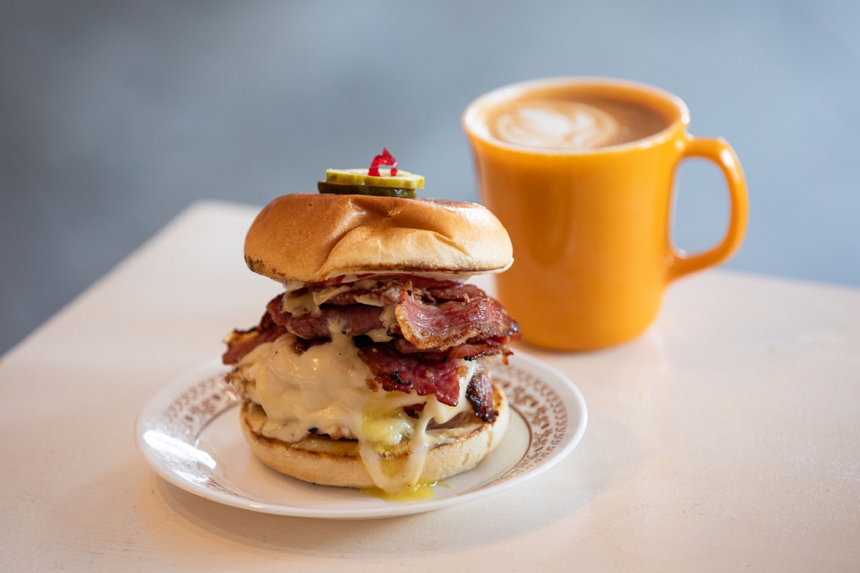 Popular menu items - The towering breakfast burger & a latte