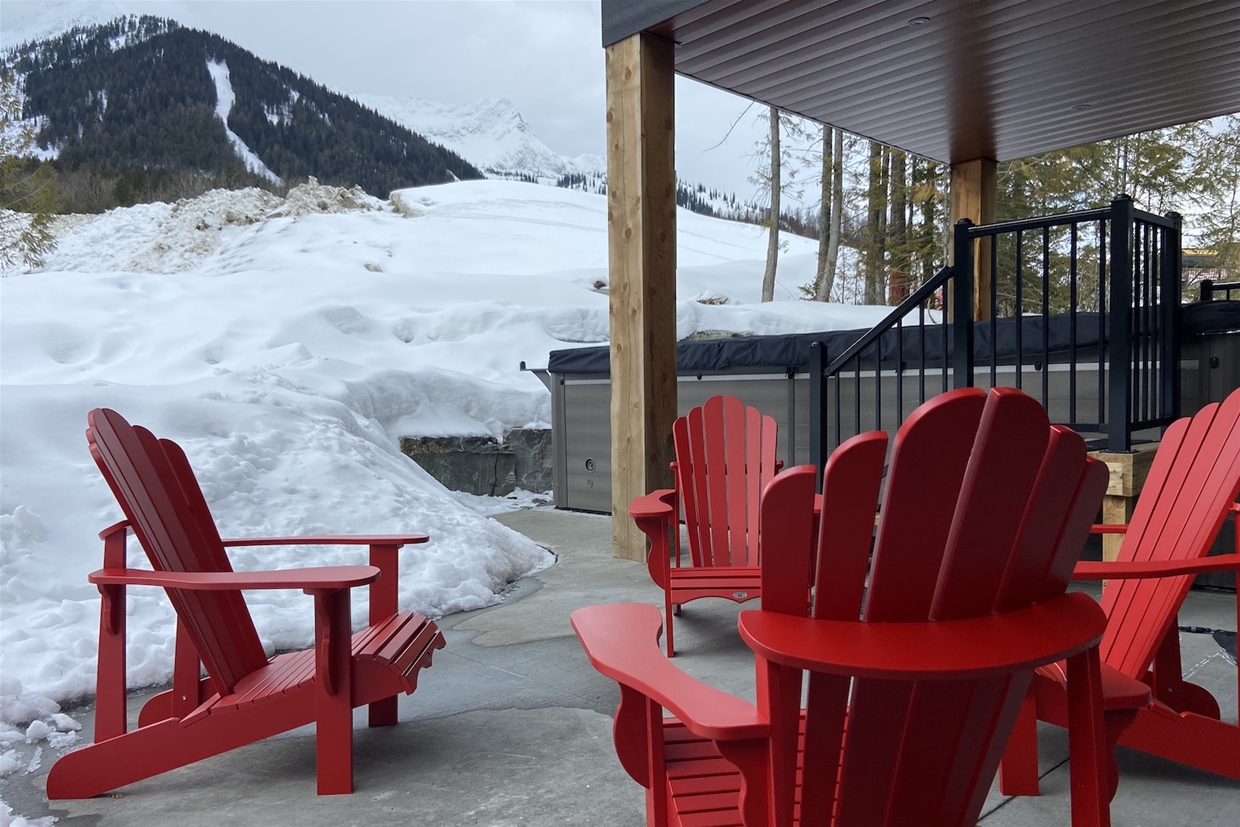 Patio seating next to the swim spa