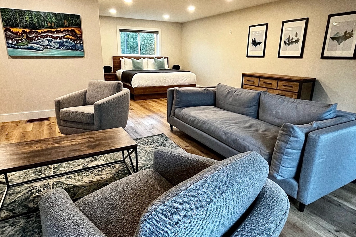 Large bedrooms each feature sitting areas with 65 inch TV