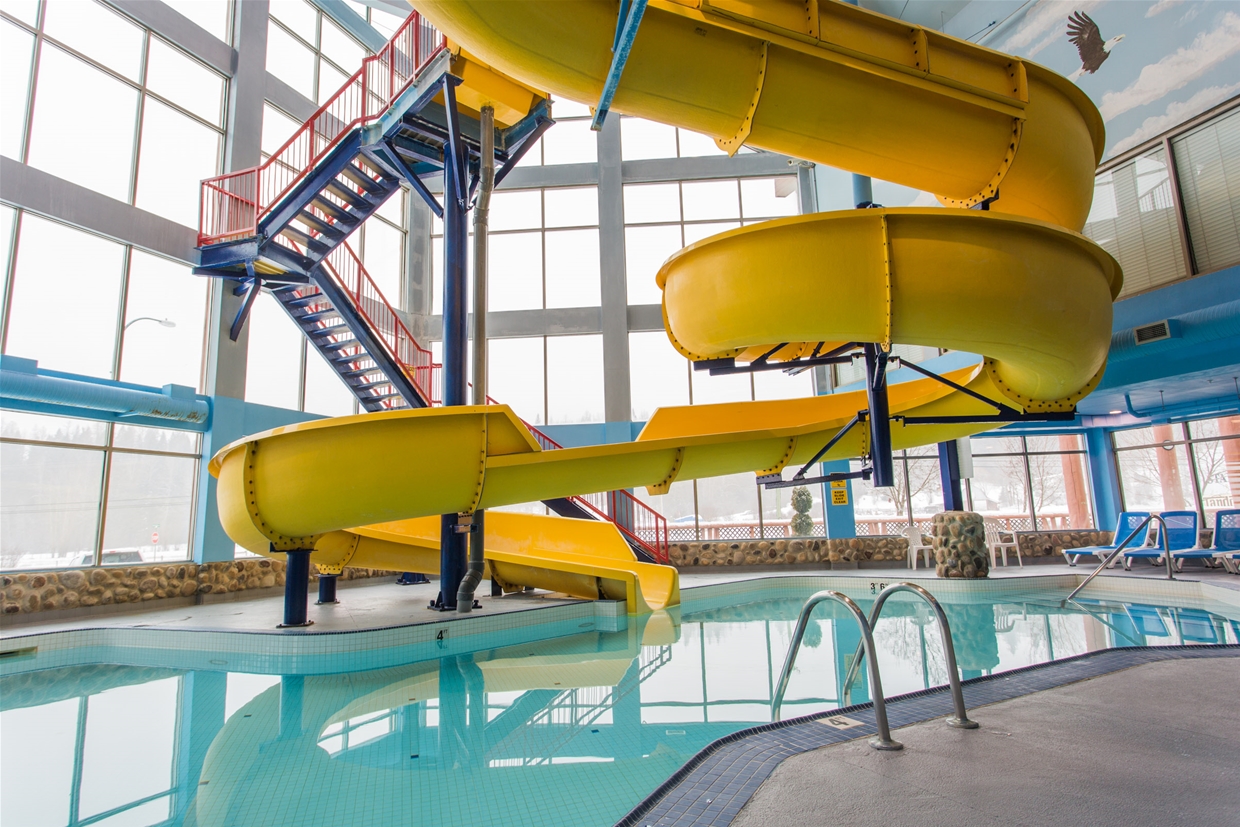 Swimming pool and slide onsite at the Stanford Hotel